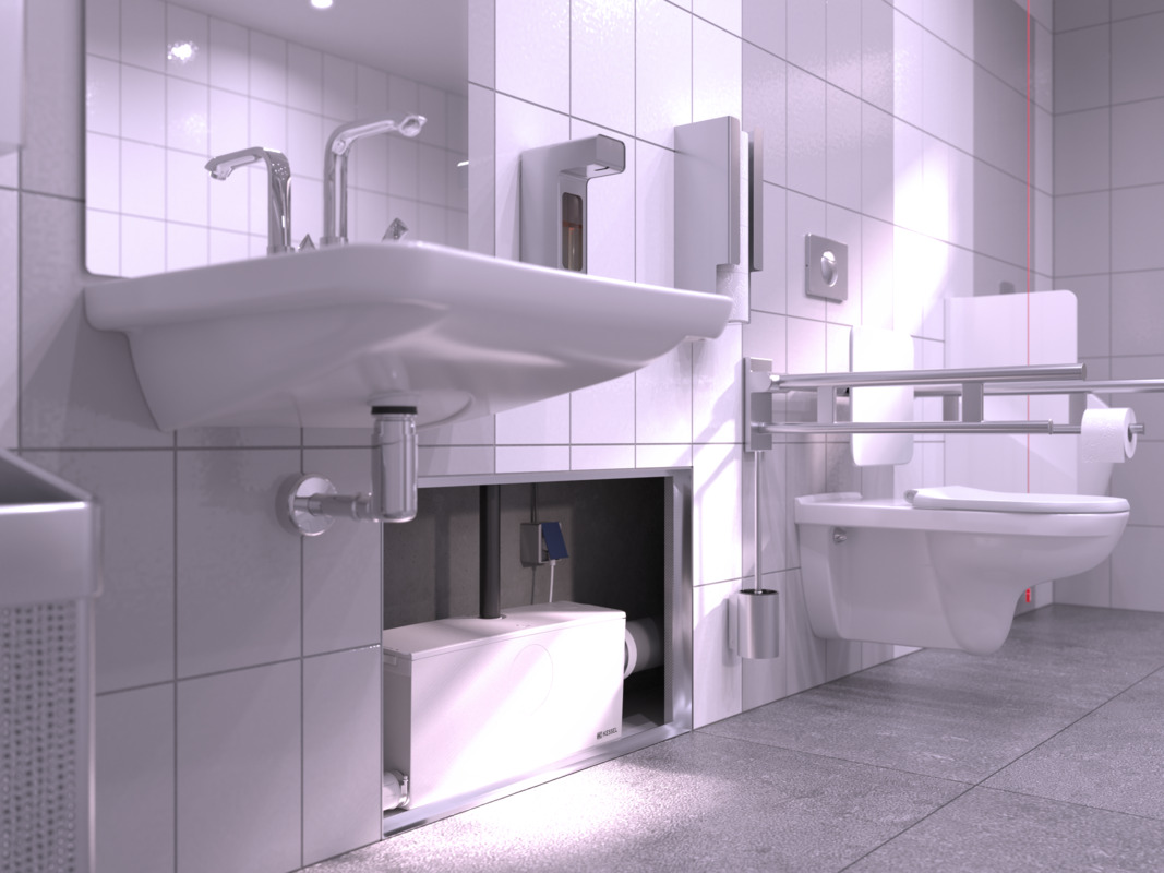 Installation diagram: Minilift L small lifting station for WC – second view A close-up of a small lifting station installed in a wall cabinet, with a connected toilet and washbasin.